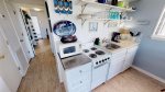Fully functional kitchenette with all the necessary appliances and cookwares - dishwasher included